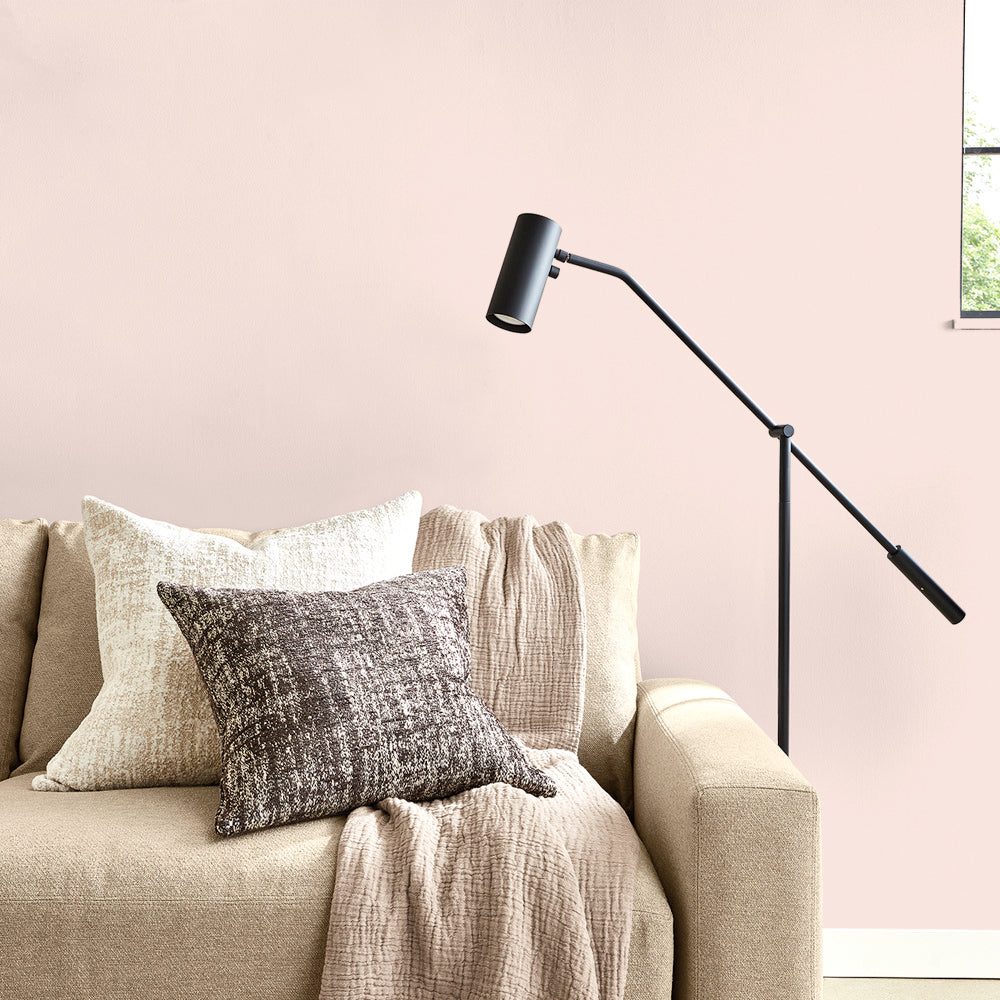 A living room painted with 0068 Summer Blush, Room &amp; Board Paint by Hirshfield&#39;s.